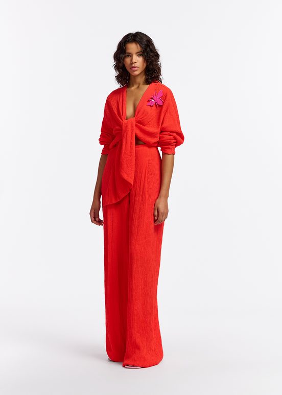 Red seersucker jumpsuit with tied front