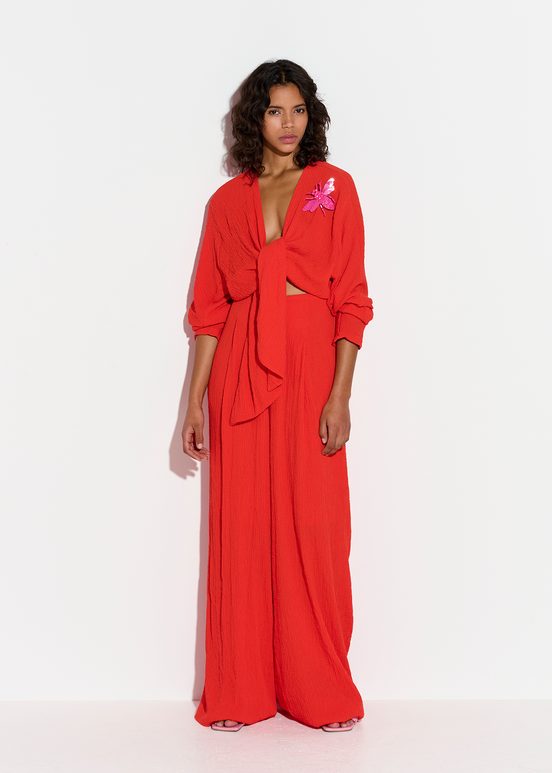 Red seersucker jumpsuit with tied front