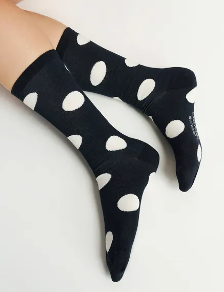 Black and white polka-dotted socks