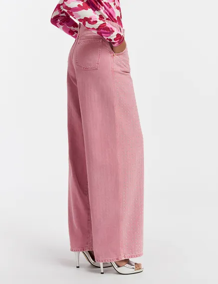 Pink rhinestone-embellished wide-leg jeans