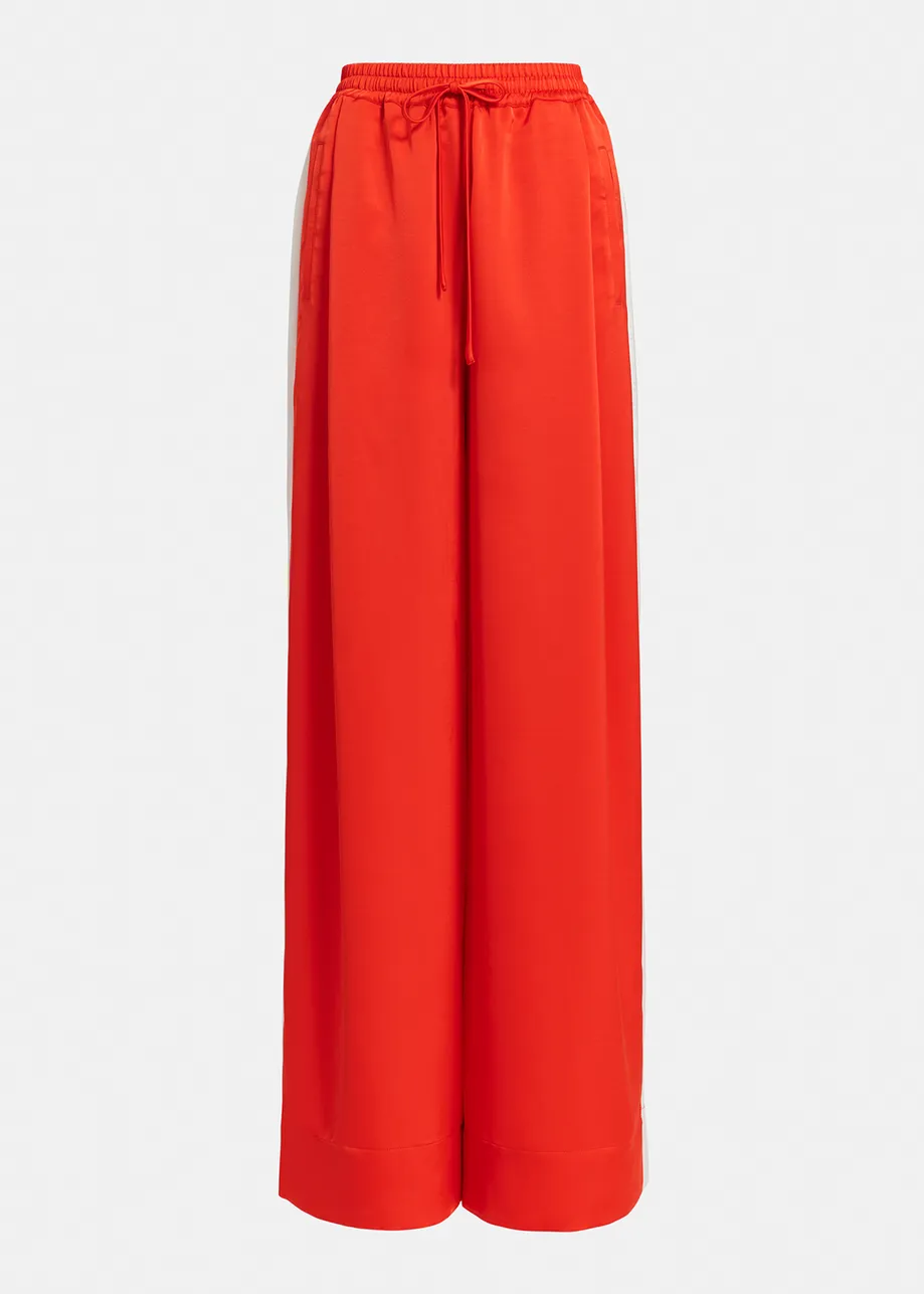Red wide-leg pants with white stripes