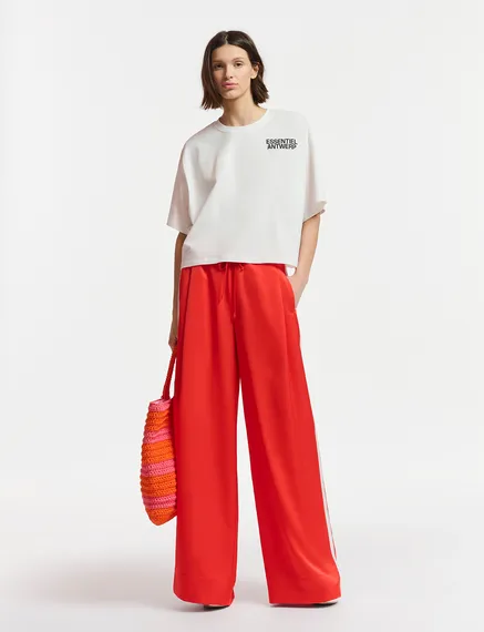 Red wide-leg pants with white stripes