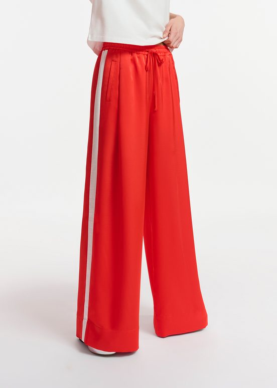 Red wide-leg pants with white stripes