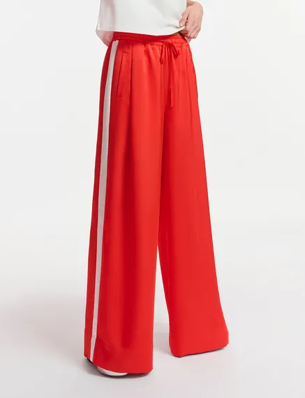 Red wide-leg pants with white stripes