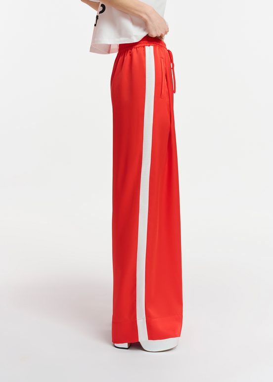 Red wide-leg pants with white stripes