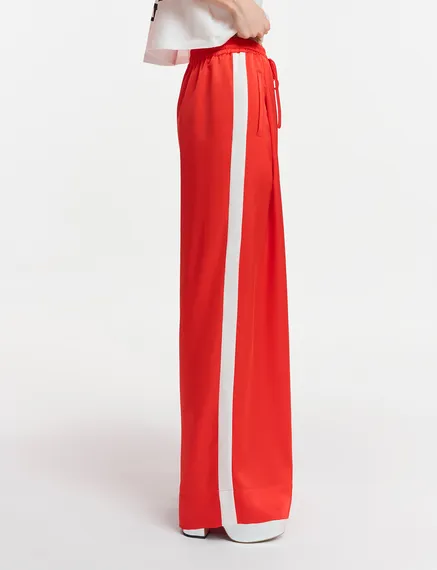 Red wide-leg pants with white stripes