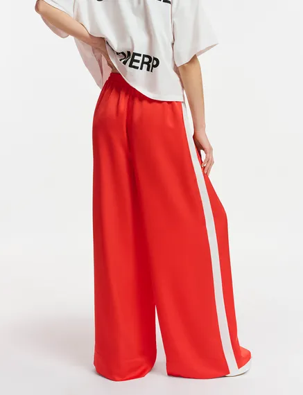 Red wide-leg pants with white stripes