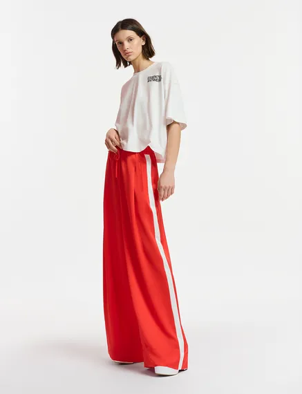 Red wide-leg pants with white stripes