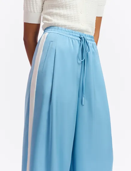 Light blue wide-leg pants with white stripes