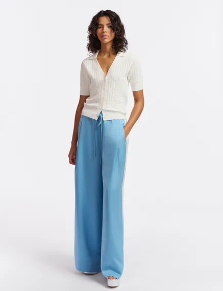 Light blue wide-leg pants with white stripes