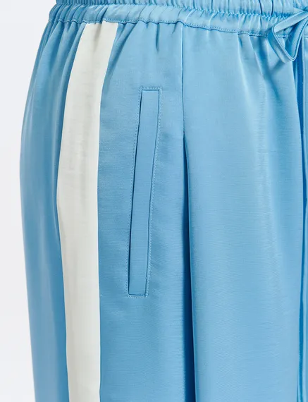 Light blue wide-leg pants with white stripes