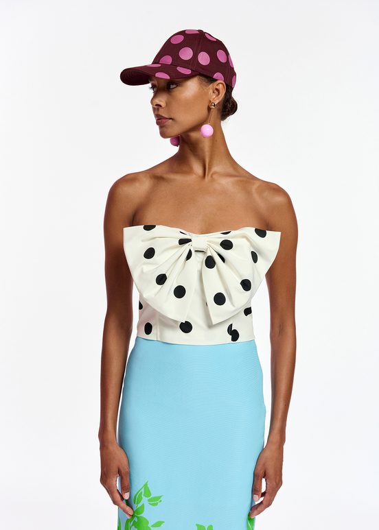 White and black polka-dot bustier top with bow