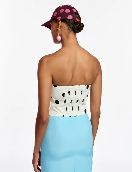 White and black polka-dot bustier top with bow