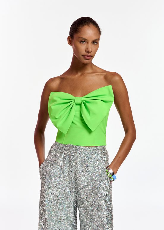 Neon green bustier top with bow