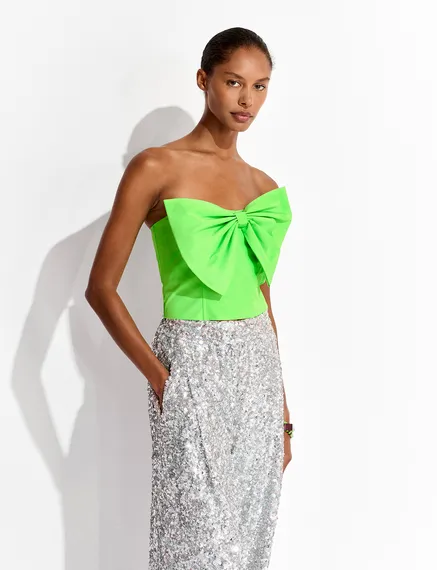 Neon green bustier top with bow