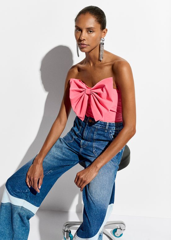 Pink bustier top with bow