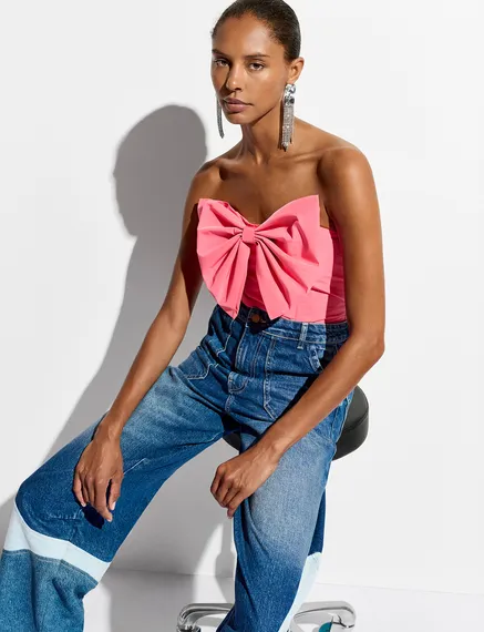 Pink bustier top with bow