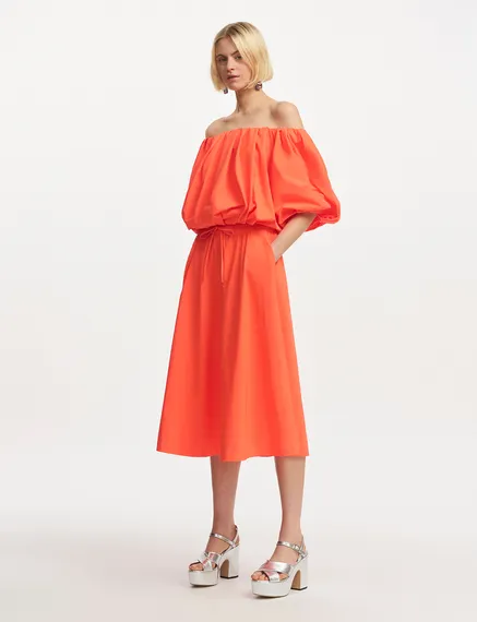 Orange gathered bodysuit with puffed sleeves