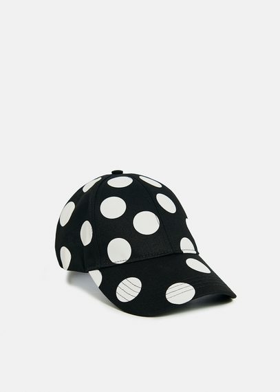 Casquette à pois noire et blanche