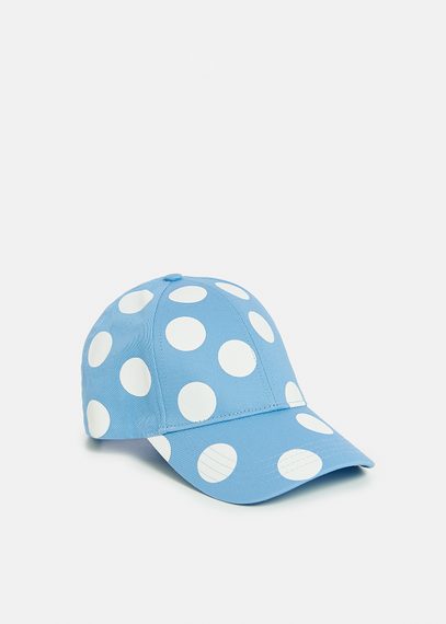 Casquette à pois bleue et blanche