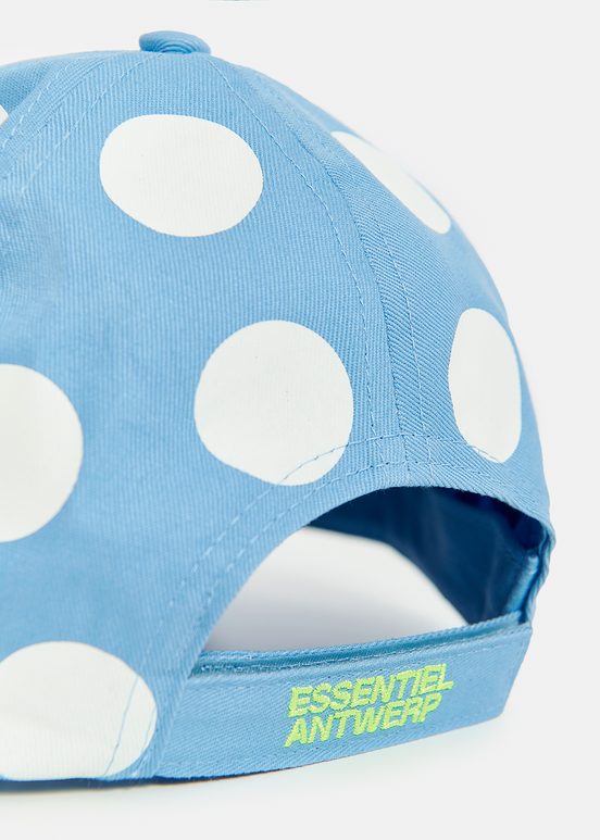 Casquette à pois bleue et blanche