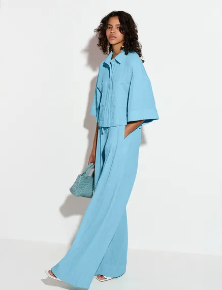 Light blue wide-leg seersucker pants