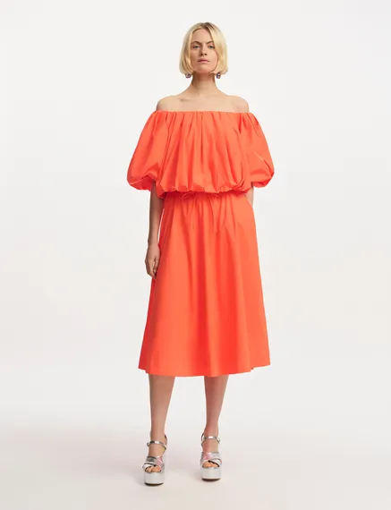 Orange midi-length A-line skirt