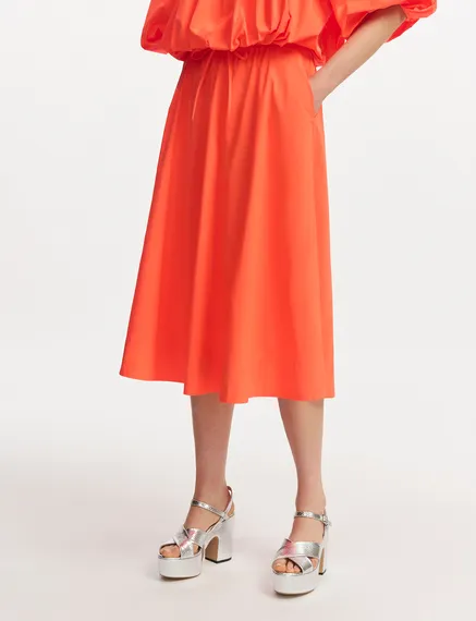 Orange midi-length A-line skirt