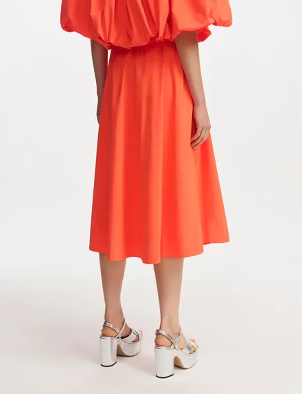 Orange midi-length A-line skirt