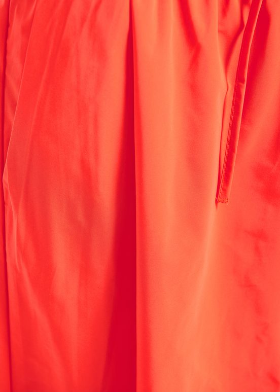 Orange midi-length A-line skirt