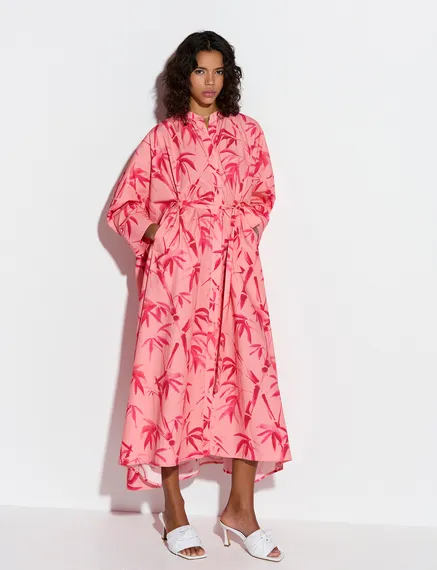 Peach and pink maxi-length dress with palm leaf print