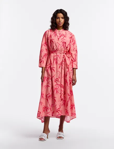 Peach and pink maxi-length dress with palm leaf print