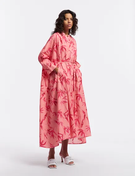 Peach and pink maxi-length dress with palm leaf print