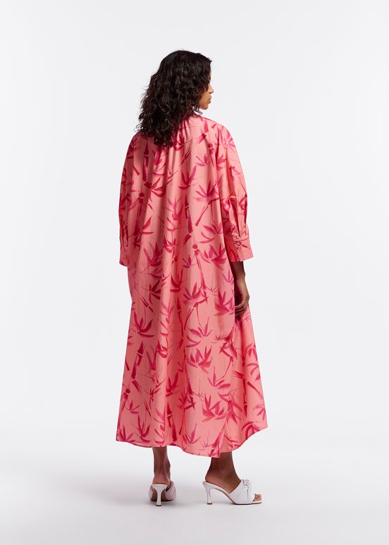 Peach and pink maxi-length dress with palm leaf print