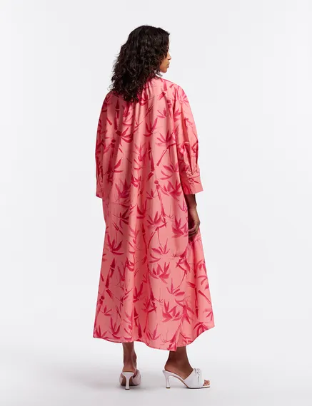 Peach and pink maxi-length dress with palm leaf print