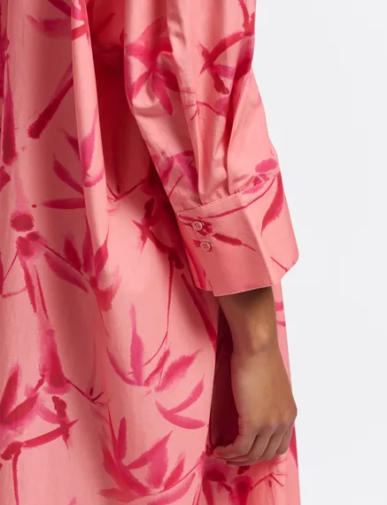 Peach and pink maxi-length dress with palm leaf print