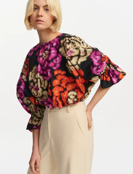 Black, orange and ecru top with puffed sleeves