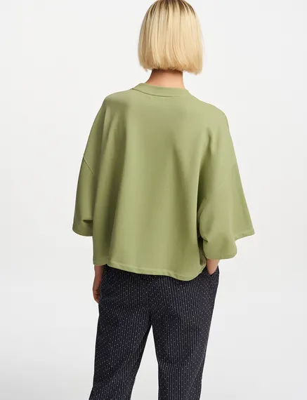 Lichtkaki sweater met korte mouwen en pailletten