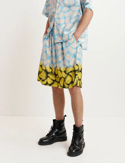 Blaue, cremefarbene und gelbe Shorts mit abstraktem Print und weitem Bein