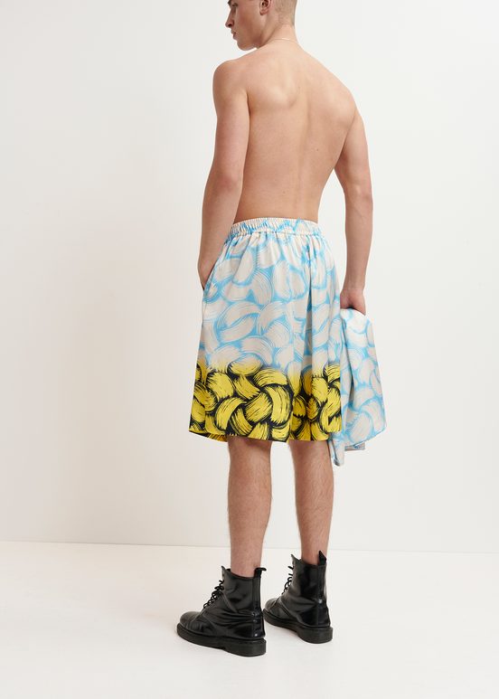 Blaue, cremefarbene und gelbe Shorts mit abstraktem Print und weitem Bein