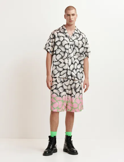 Schwarze, cremefarbene und rosa Shorts mit abstraktem Print und weitem Bein