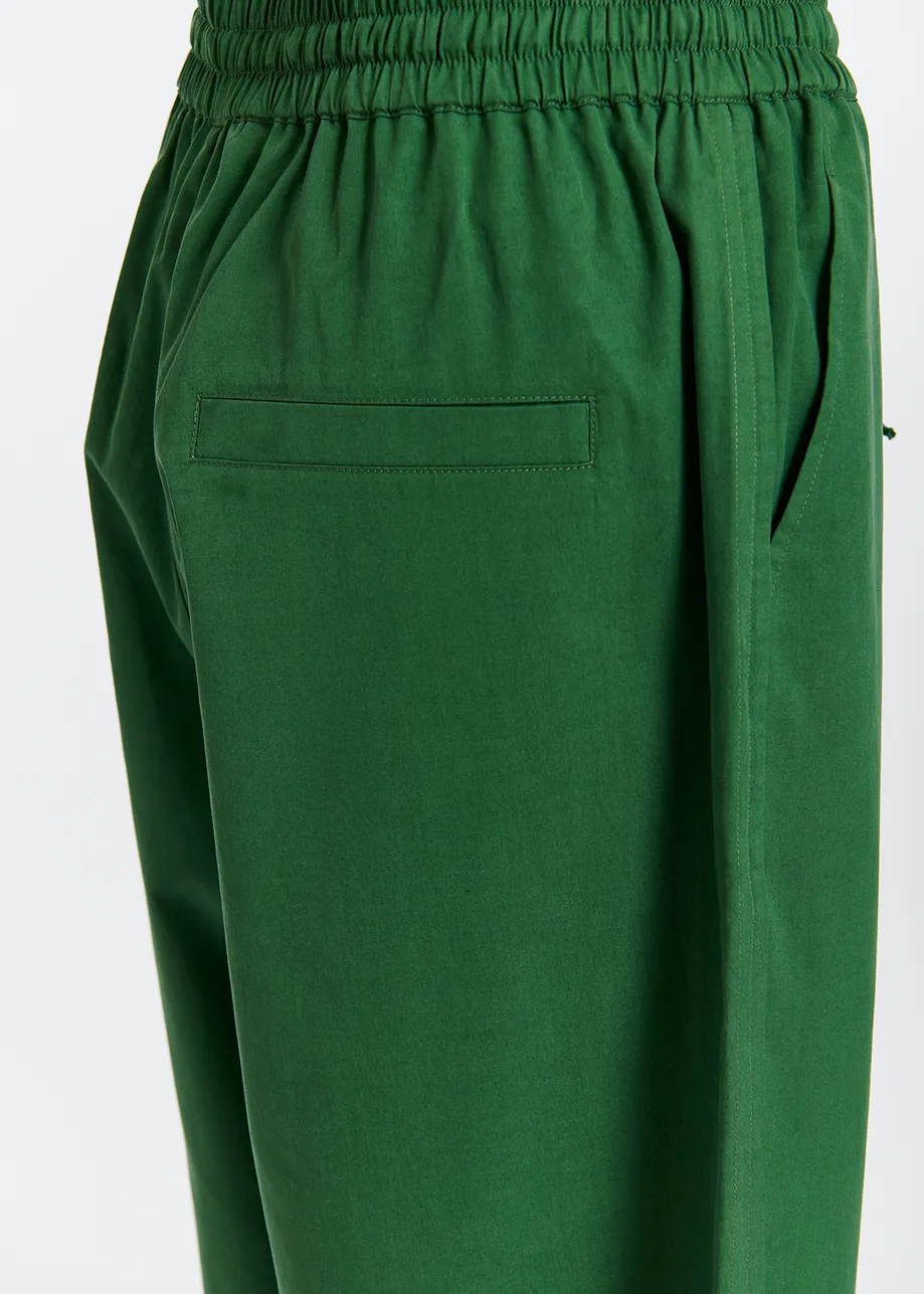 Dark green tapered-leg pants
