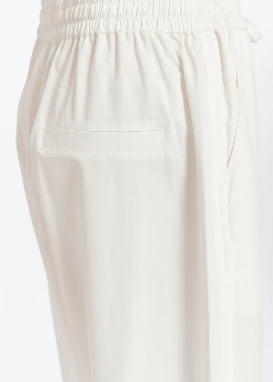 Off-white tapered-leg pants