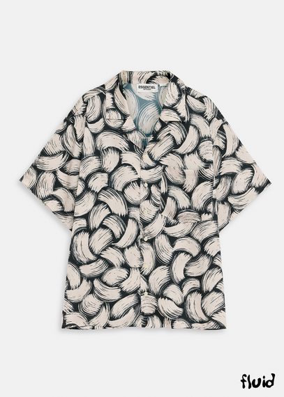 Black and off-white short-sleeved shirt with abstract print