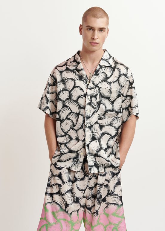 Black and off-white short-sleeved shirt with abstract print