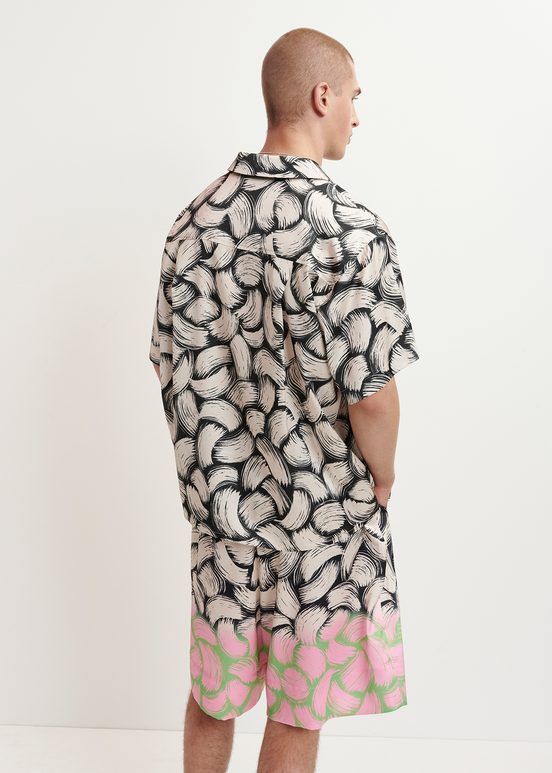 Black and off-white short-sleeved shirt with abstract print