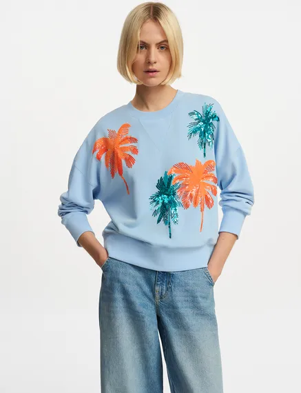 Light blue organic cotton sweatshirt with sequin and bead embroideries