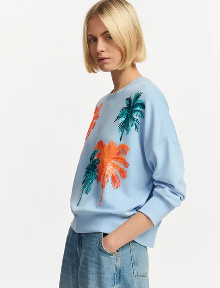 Light blue organic cotton sweatshirt with sequin and bead embroideries