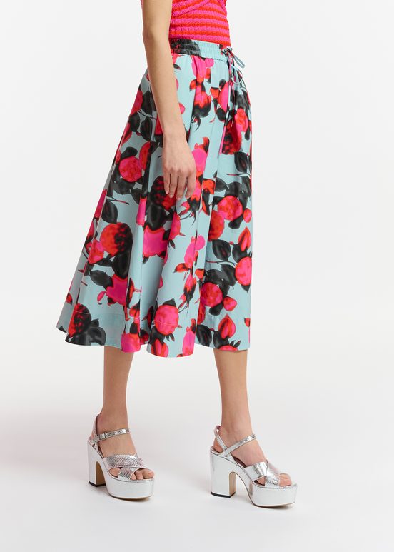 Light blue midi-length A-line skirt with floral print