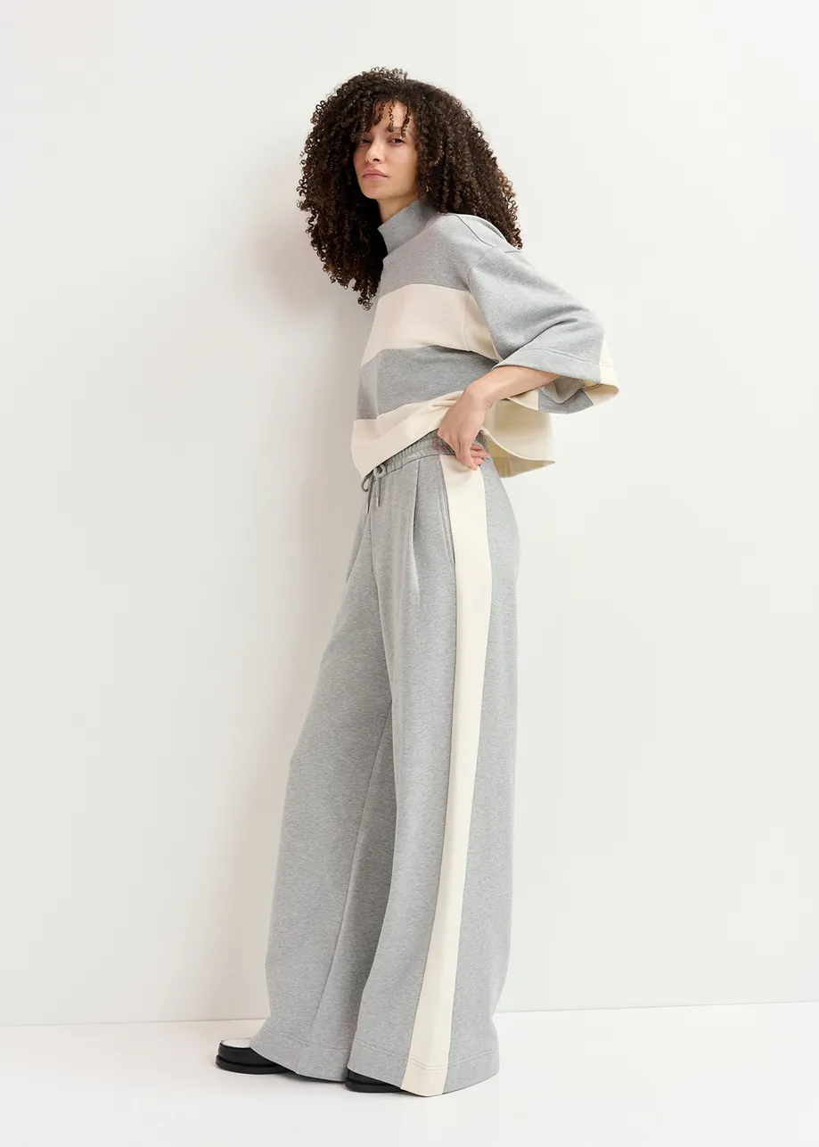 Grey wide-leg track pants with off-white stripes